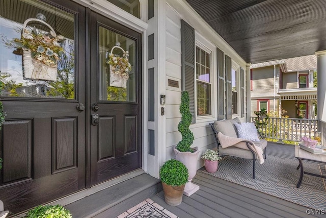 54 W 5th St, Oswego-City, NY 13126 - doorway to property with a porch and french doors