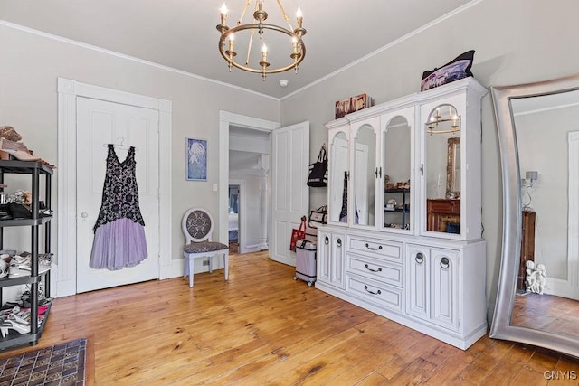 54 W 5th St, Oswego-City, NY 13126 - bedroom with a chandelier, crown molding, and light wood-type flooring