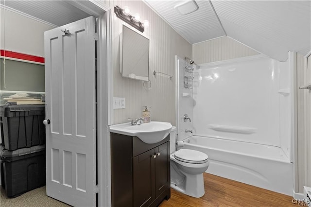 54 W 5th St, Oswego-City, NY 13126 - full bath featuring vanity, wood finished floors, toilet, and shower / washtub combination