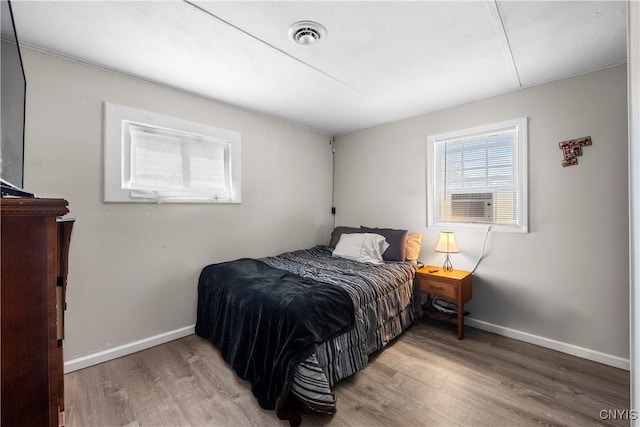 30 Bakeman St, Fulton, NY 13069 - bedroom featuring wood finished floors and baseboards