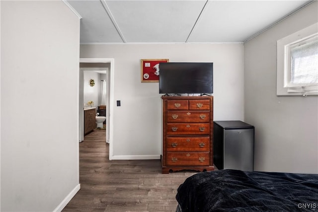 30 Bakeman St, Fulton, NY 13069 - bedroom with baseboards, ornamental molding, wood finished floors, and attic access