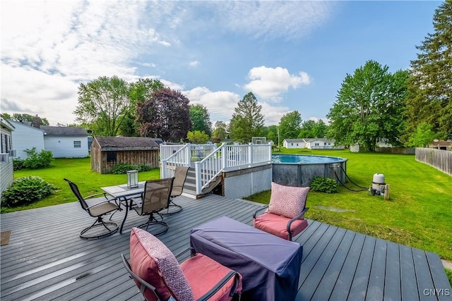 30 Bakeman St, Fulton, NY 13069 - wooden deck with outdoor dining space and an outdoor pool
