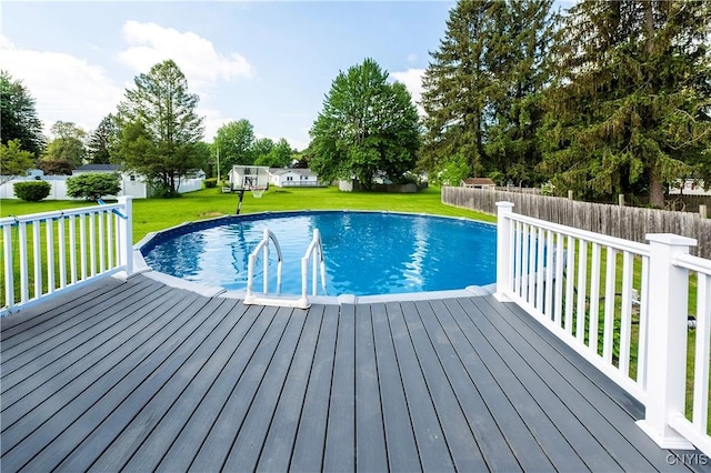 30 Bakeman St, Fulton, NY 13069 - view of swimming pool featuring a wooden deck