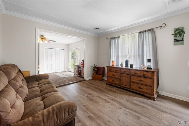 30 Bakeman St, Fulton, NY 13069 - living area featuring light wood-style floors, ornamental molding, baseboards, and ceiling fan