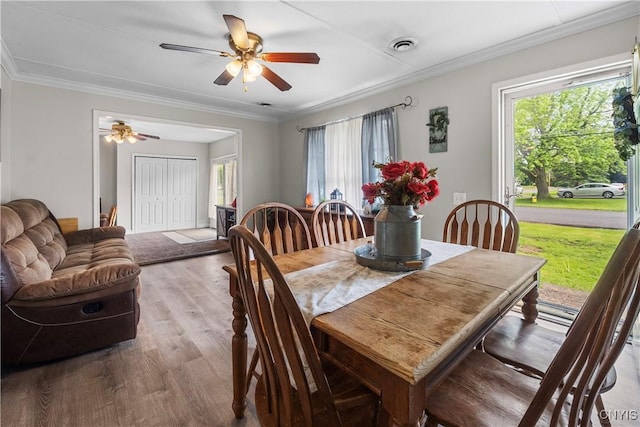 30 Bakeman St, Fulton, NY 13069 - dining area featuring wood finished floors, ceiling fan, and ornamental molding