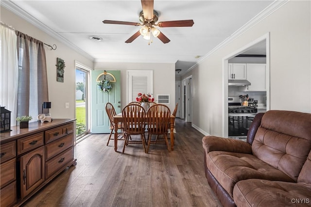 30 Bakeman St, Fulton, NY 13069 - dining area featuring dark wood finished floors, ceiling fan, crown molding, and baseboards