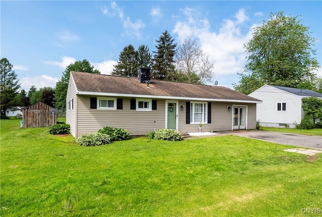 30 Bakeman St, Fulton, NY 13069 - ranch-style house featuring a front yard and a chimney