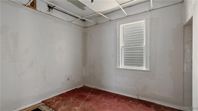 318 14th St, Buffalo, NY 14213 - unfurnished room with concrete floors and baseboards