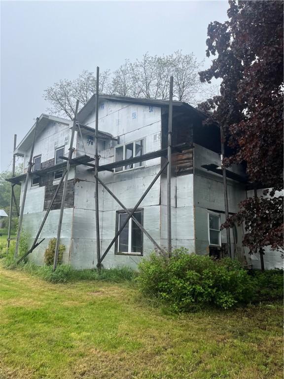 8193 State Highway 206, Tompkins, NY 13839 - view of property exterior featuring a lawn and a balcony