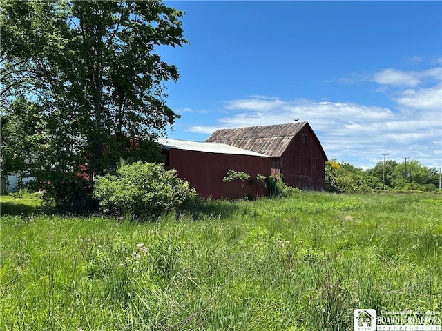 12298 Alleghany Rd, Hanover, NY 14136 - view of home's exterior featuring an outdoor structure and a barn