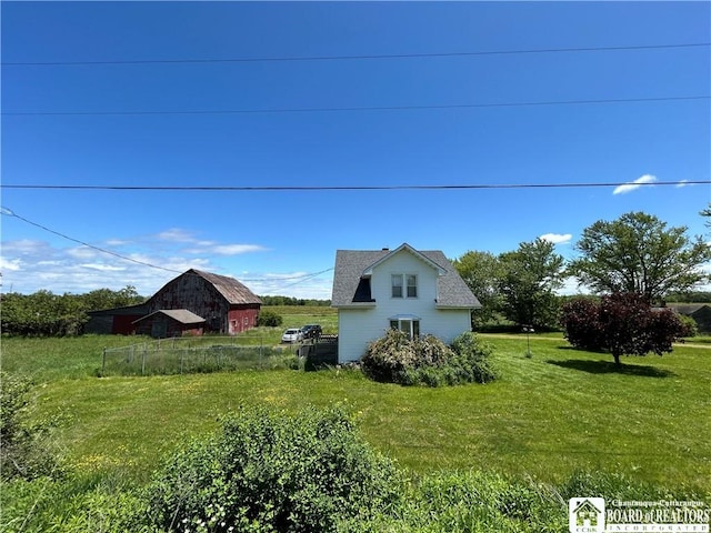 12298 Alleghany Rd, Hanover, NY 14136 - view of green lawn with a barn and an outbuilding