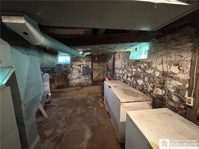 12298 Alleghany Rd, Hanover, NY 14136 - below grade area featuring water heater and healthy amount of natural light