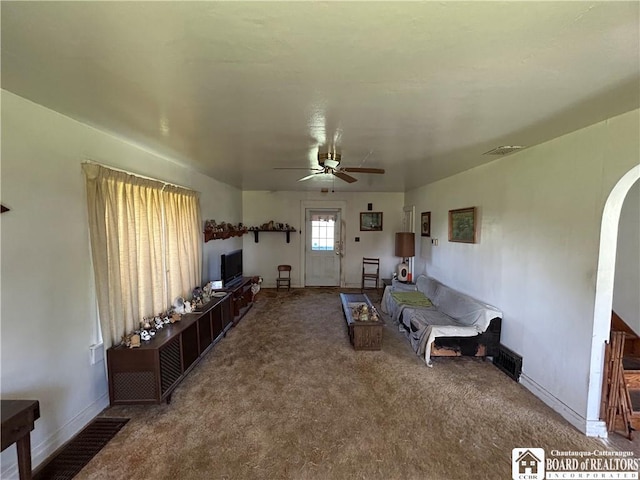 12298 Alleghany Rd, Hanover, NY 14136 - carpeted living room with a ceiling fan, baseboards, and arched walkways