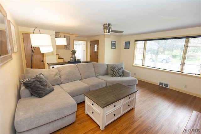 50 Cambria St, Lancaster, NY 14086 - living area featuring ceiling fan, baseboards, and light wood finished floors