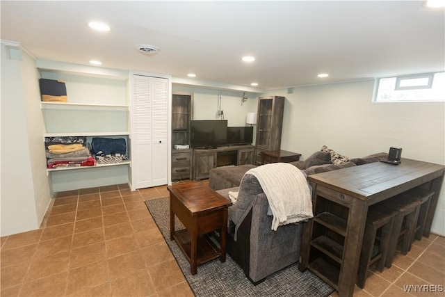 50 Cambria St, Lancaster, NY 14086 - tiled living room featuring recessed lighting