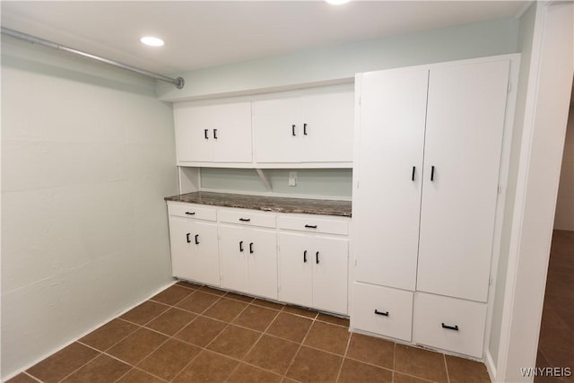 50 Cambria St, Lancaster, NY 14086 - laundry area featuring dark tile patterned flooring and recessed lighting