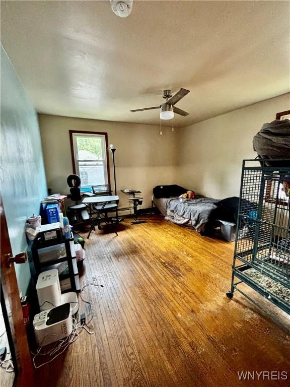 761 4th St, Niagara Falls, NY 14301 - bedroom featuring hardwood / wood-style flooring and an office area