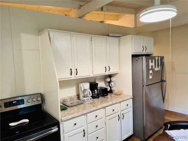 274 S Shore Rd, Webb, NY 13420 - kitchen featuring stainless steel appliances, beam ceiling, white cabinetry, wood finished floors, and light stone countertops