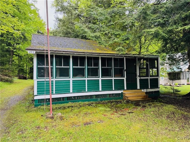 274 S Shore Rd, Webb, NY 13420 - view of outdoor structure featuring entry steps and a sunroom