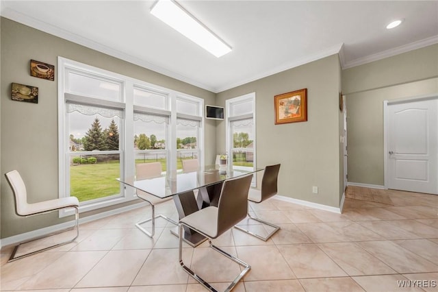 3906 Ontario Dr, Wheatfield, NY 14120 - dining area featuring ornamental molding, baseboards, and light tile patterned floors