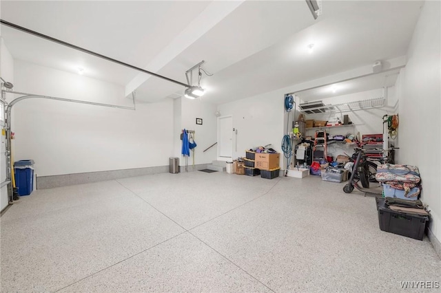 3906 Ontario Dr, Wheatfield, NY 14120 - garage featuring a garage door opener