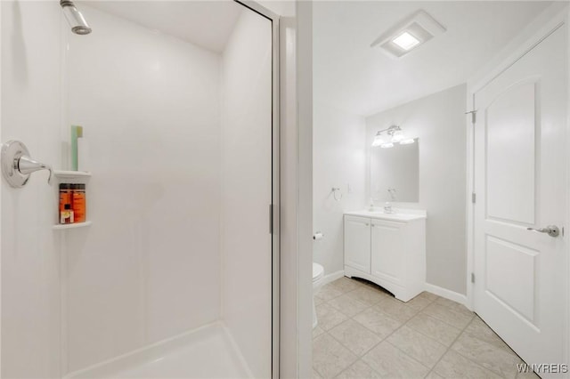 3906 Ontario Dr, Wheatfield, NY 14120 - bathroom with a stall shower, vanity, toilet, and baseboards