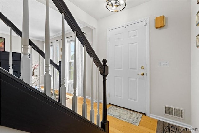 1660 Shallow Creek Trl, Webster, NY 14580 - entryway with wood finished floors, stairs, and baseboards