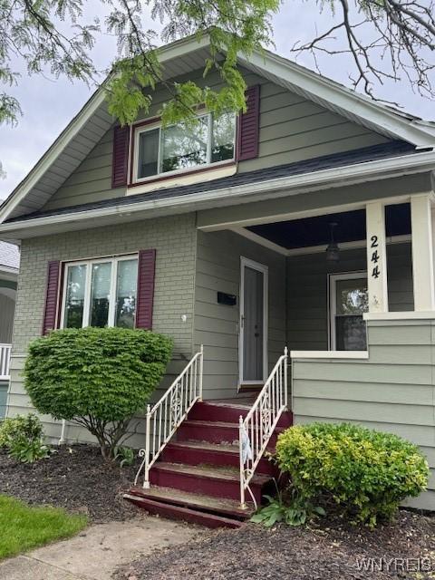 244 Parkwood Ave, Tonawanda-Town, NY 14217 - bungalow with covered porch and brick siding