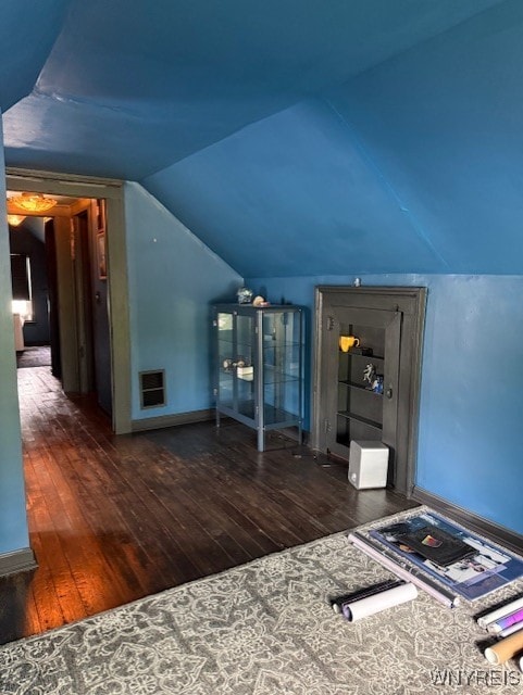 244 Parkwood Ave, Tonawanda-Town, NY 14217 - additional living space featuring wood-type flooring, vaulted ceiling, and baseboards