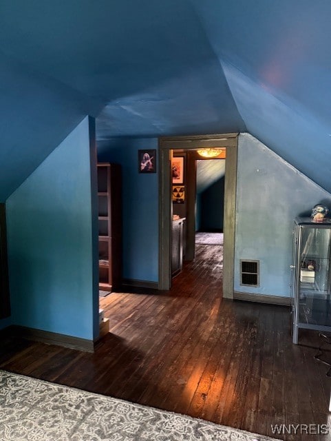 244 Parkwood Ave, Tonawanda-Town, NY 14217 - additional living space featuring hardwood / wood-style flooring, vaulted ceiling, and baseboards
