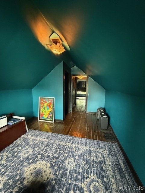 244 Parkwood Ave, Tonawanda-Town, NY 14217 - additional living space featuring wood finished floors and vaulted ceiling