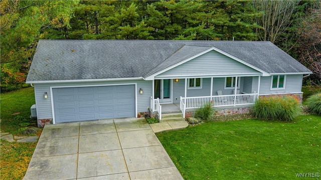 8654 Rochester Rd, Royalton, NY 14067 - ranch-style home featuring a porch, an attached garage, concrete driveway, and a front yard