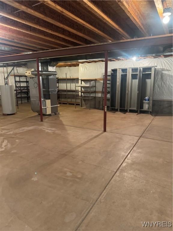 8654 Rochester Rd, Royalton, NY 14067 - unfinished basement with heating unit and gas water heater