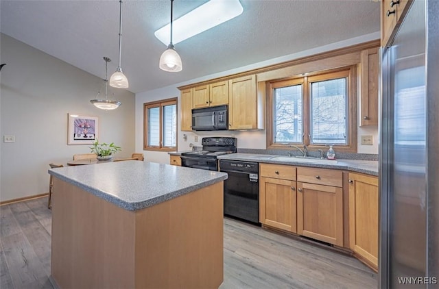 8654 Rochester Rd, Royalton, NY 14067 - kitchen featuring black appliances, a center island, light wood-style floors, light brown cabinetry, and pendant lighting