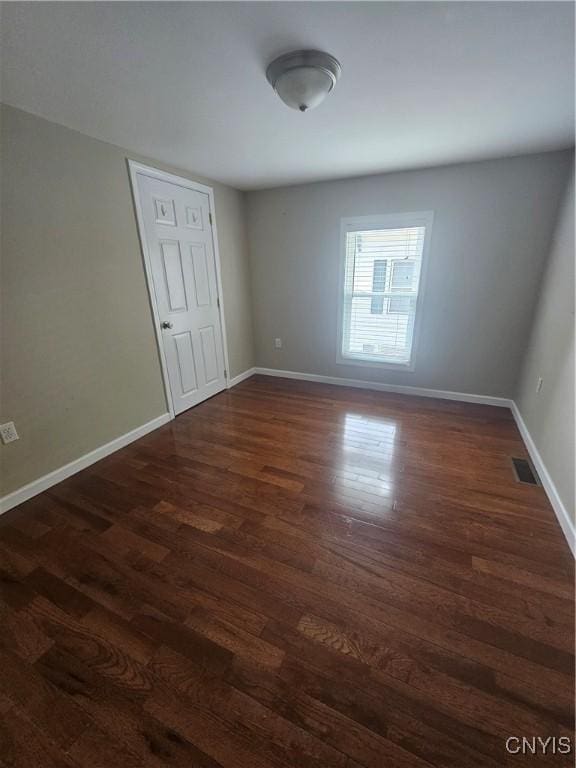 25 Vincent St, Champion, NY 13619 - empty room with dark wood-style flooring and baseboards