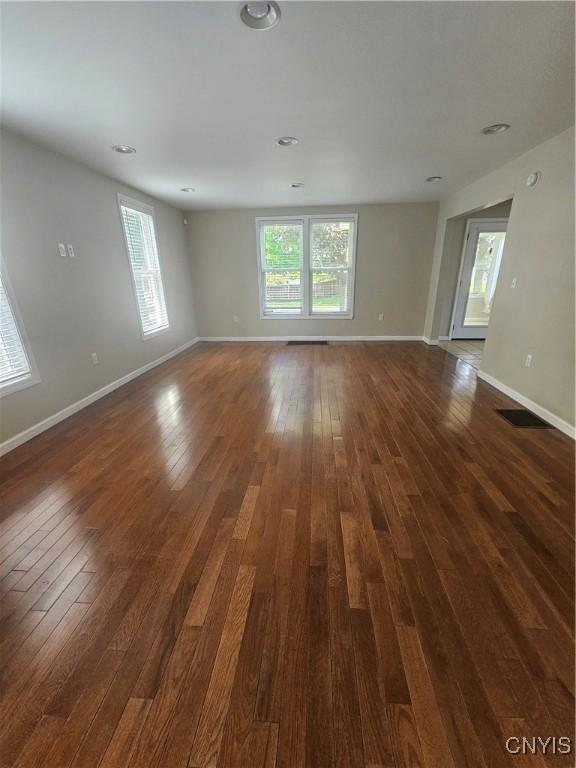 25 Vincent St, Champion, NY 13619 - empty room featuring dark wood finished floors and baseboards