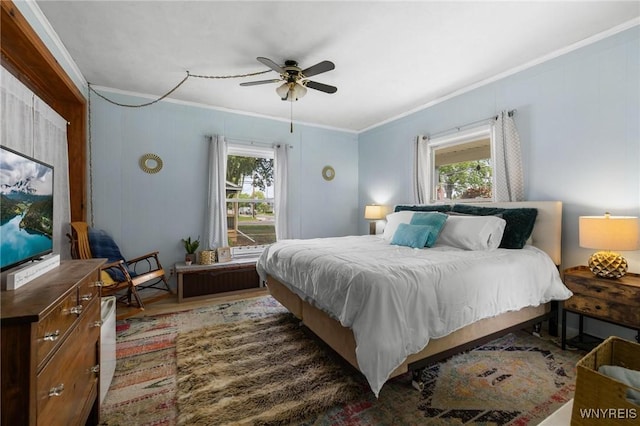 2654 Main St, Newfane, NY 14108 - bedroom with ornamental molding, ceiling fan, and wood finished floors