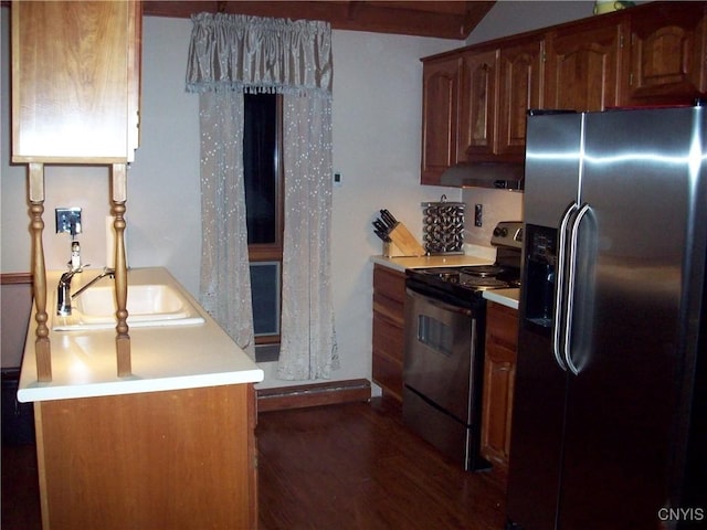 47089 County Route 100, Alexandria, NY 13640 - kitchen with refrigerator with ice dispenser, stainless steel range with electric stovetop, a sink, dark wood-style flooring, and light countertops