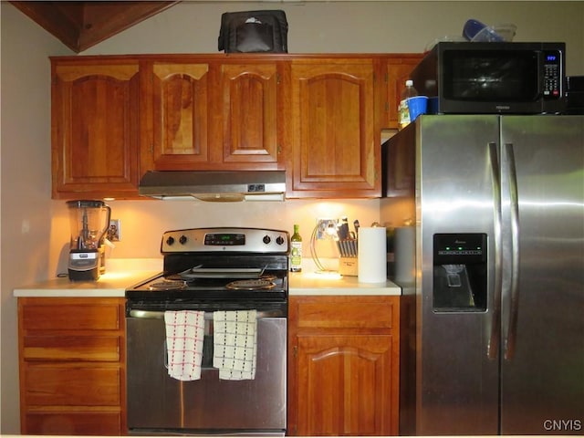 47089 County Route 100, Alexandria, NY 13640 - kitchen with appliances with stainless steel finishes, extractor fan, light countertops, and brown cabinets