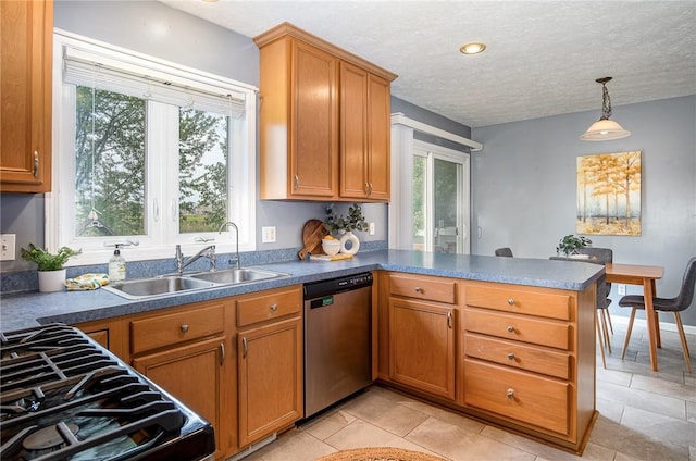 65 Geraldine Pkwy, Gates, NY 14624 - kitchen with dishwasher, a sink, a peninsula, healthy amount of natural light, and a textured ceiling