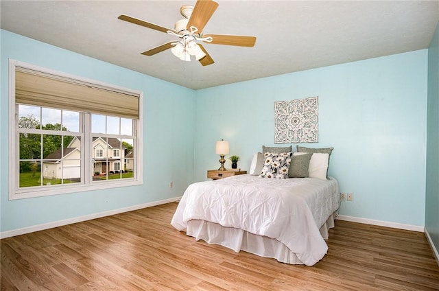65 Geraldine Pkwy, Gates, NY 14624 - bedroom featuring wood finished floors, baseboards, and a ceiling fan