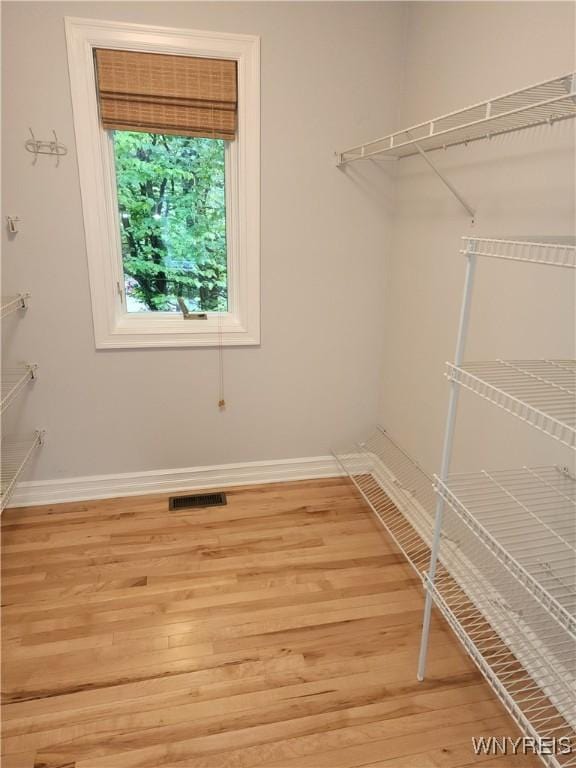 6731 Chestnut Ridge Rd, Orchard Park, NY 14127 - spacious closet with light wood finished floors