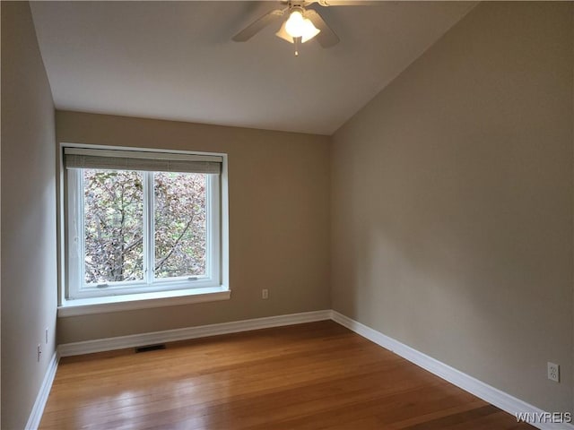 6731 Chestnut Ridge Rd, Orchard Park, NY 14127 - spare room with wood finished floors, ceiling fan, and baseboards