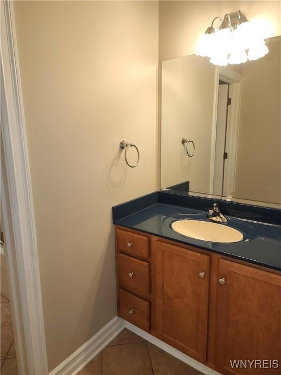 6731 Chestnut Ridge Rd, Orchard Park, NY 14127 - bathroom with vanity, tile patterned floors, and baseboards