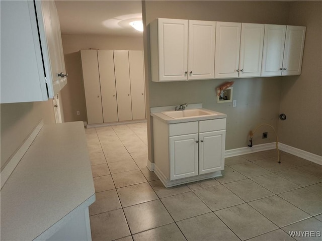 6731 Chestnut Ridge Rd, Orchard Park, NY 14127 - laundry area featuring washer hookup, light tile patterned flooring, cabinet space, and hookup for a gas dryer