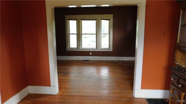 409 E Bloomfield St, Rome-Inside, NY 13440 - unfurnished room with wood finished floors and baseboards