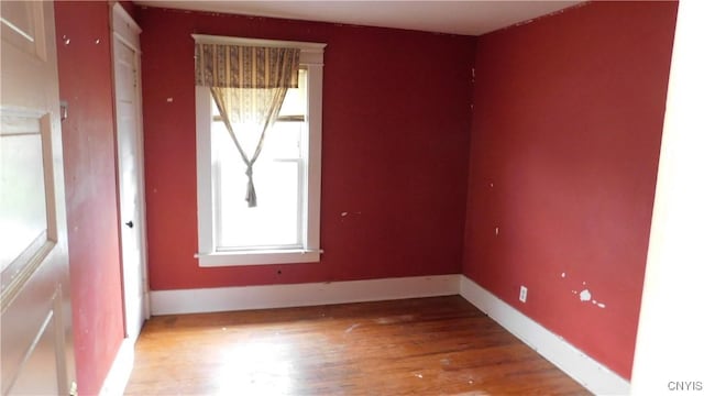 409 E Bloomfield St, Rome-Inside, NY 13440 - spare room with light wood-style flooring and baseboards