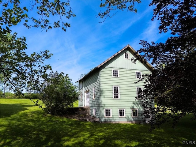 5199 W Lake Rd, Fleming, NY 13021 - view of side of home with a lawn