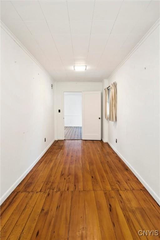5199 W Lake Rd, Fleming, NY 13021 - spare room with hardwood / wood-style flooring, ornamental molding, and baseboards
