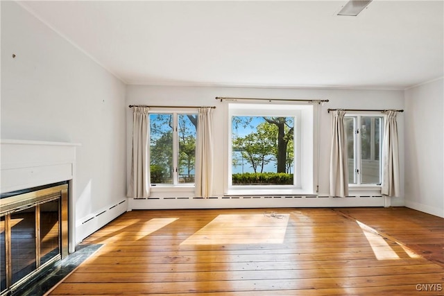 5199 W Lake Rd, Fleming, NY 13021 - unfurnished living room featuring hardwood / wood-style flooring and a fireplace with flush hearth